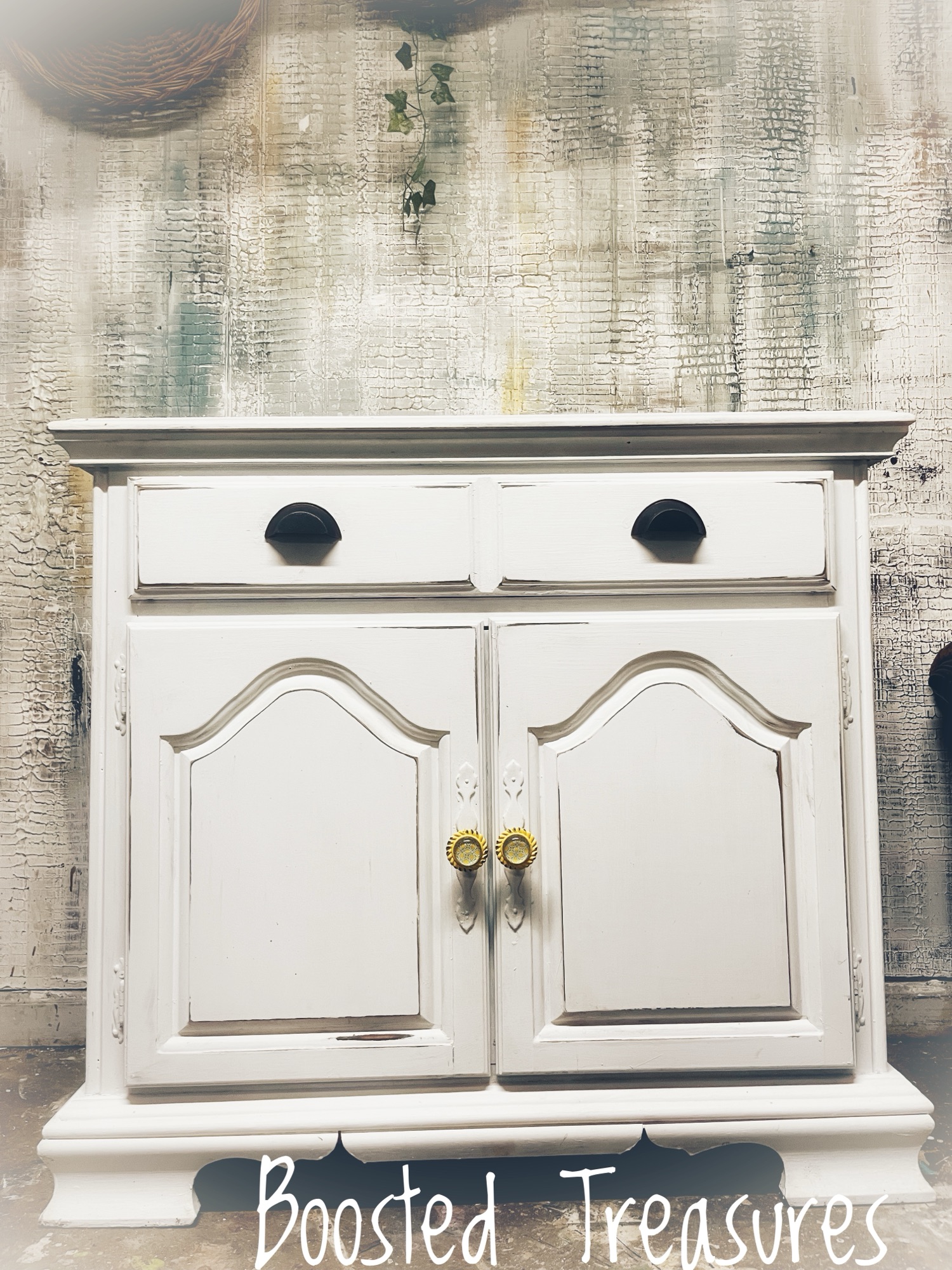 White hand-painted cabinet with lattice doors