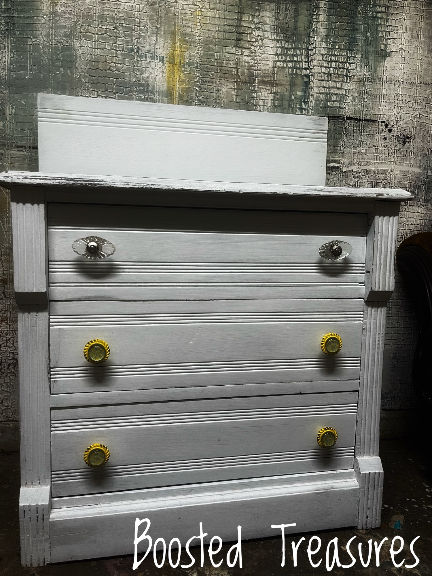 White painted nightstand with gold knobs